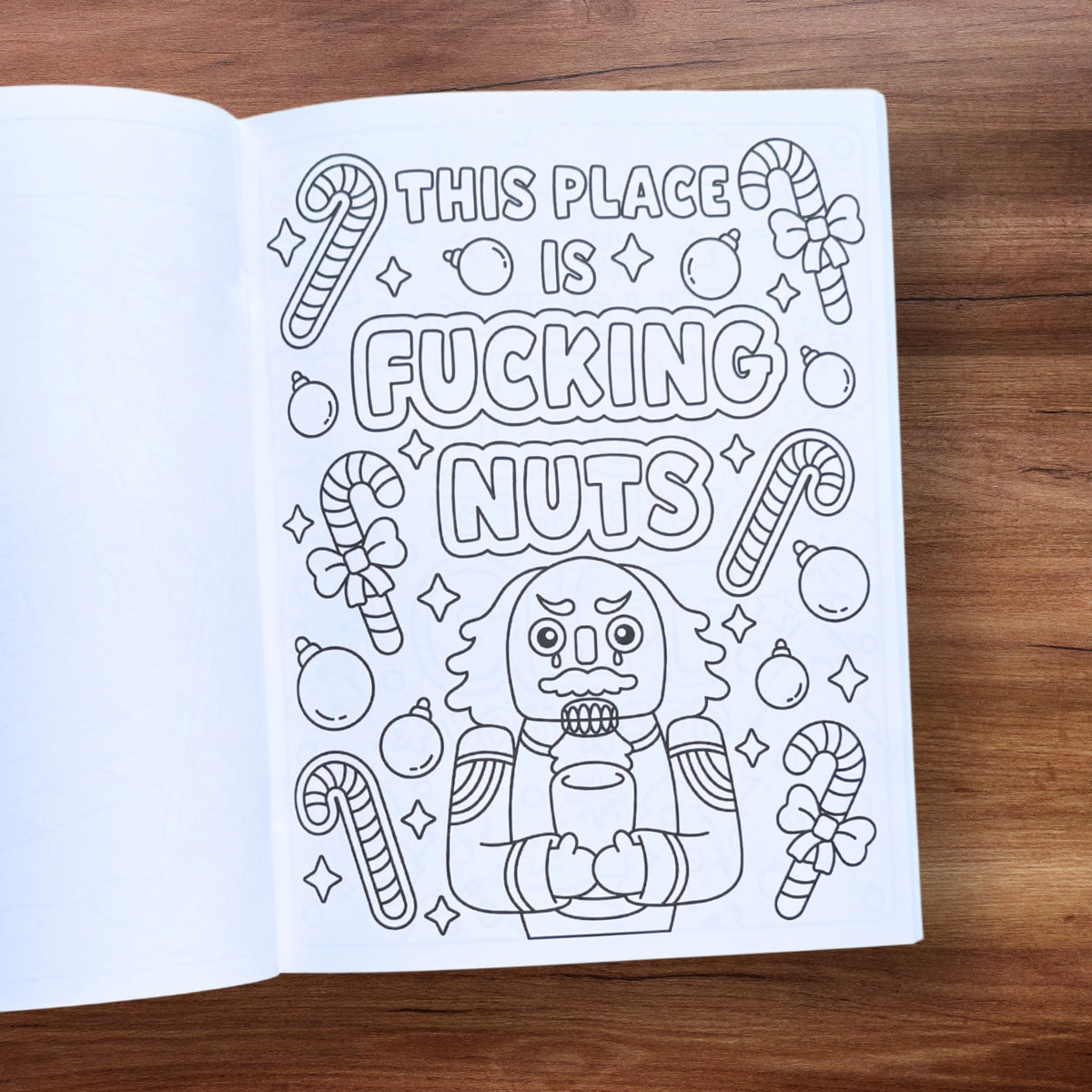 "This Place Is F*cking Nuts" nutcracker coloring page with candy canes – Christmas swear word coloring book